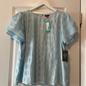 Vince Camuto Tulip Sleeve Crew Neck Blouse in light blue.